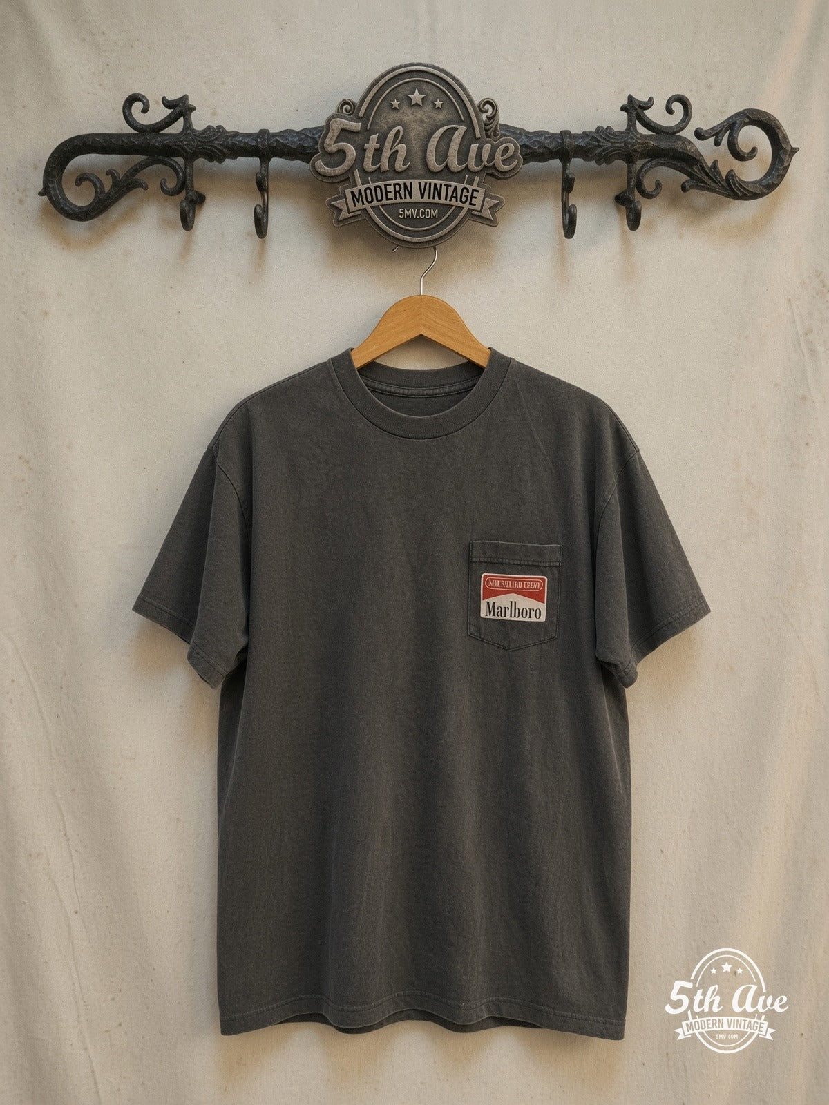 Marlboro Dirt Bike vintage graphic tee, front view on a display rack