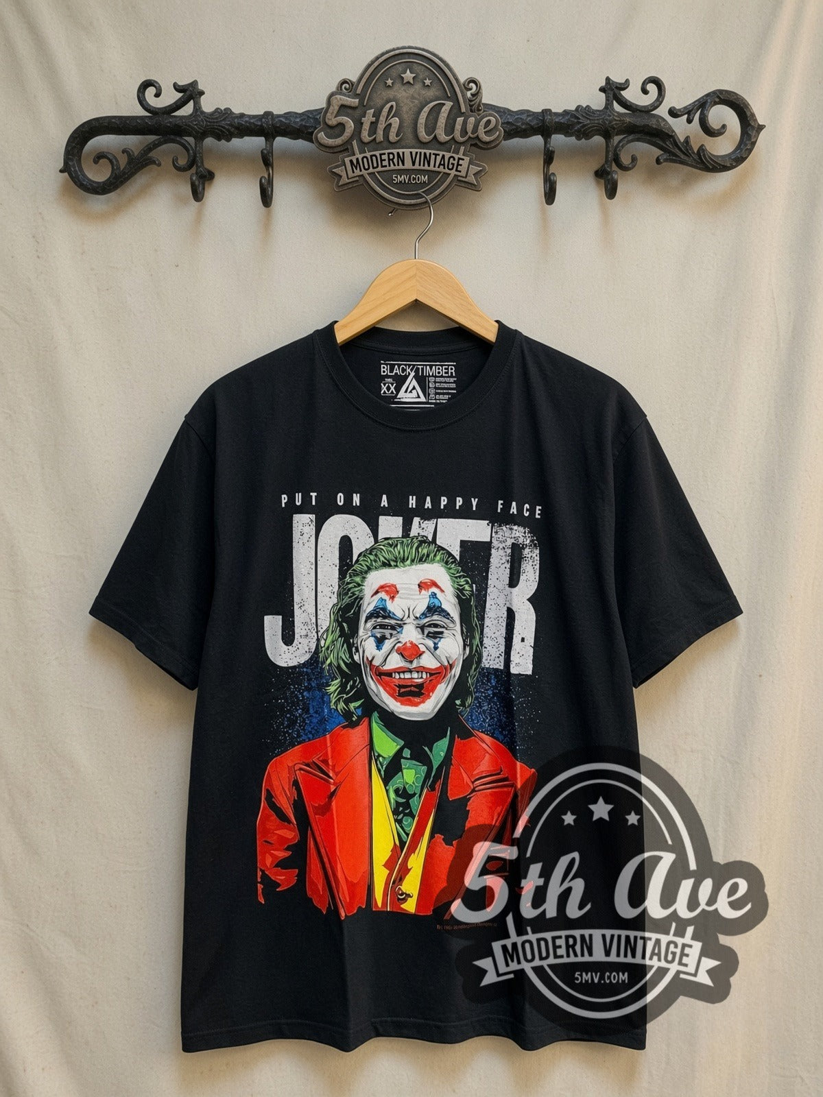 Joker Arthur Fleck vintage graphic t-shirt, front view on a display rack