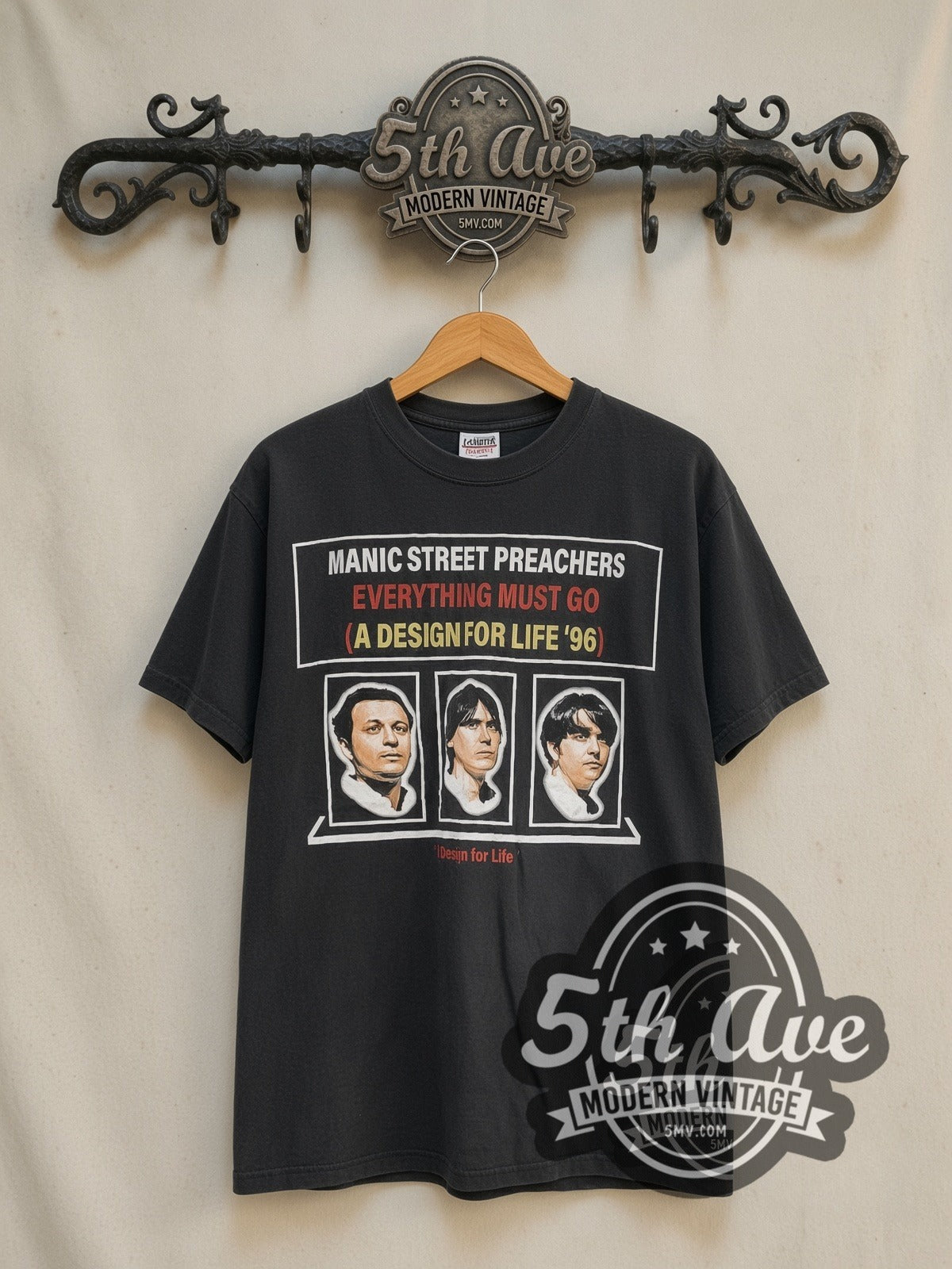 Manic Street Preachers A Design for Life '96 vintage band t-shirt in black, front view on a display rack