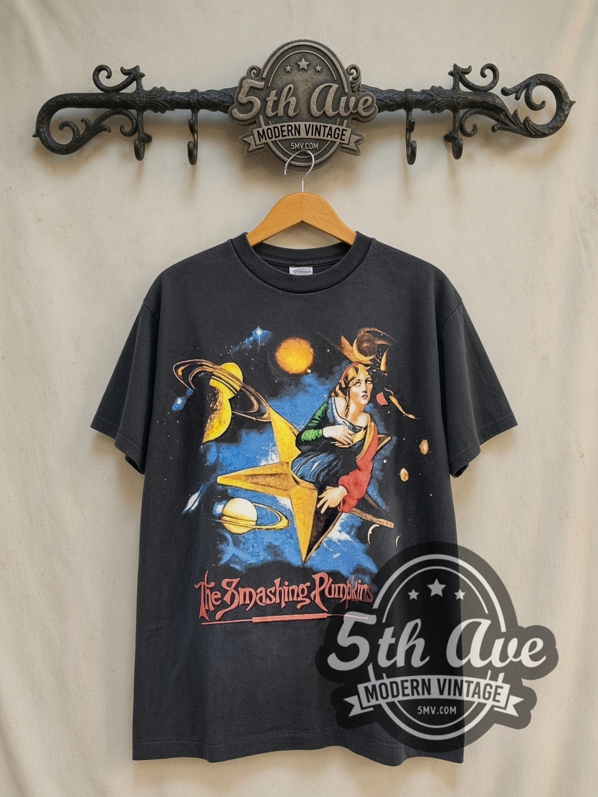 The Smashing Pumpkins Mellon Collie Zero Star Back vintage band t-shirt in black, front view on a display rack