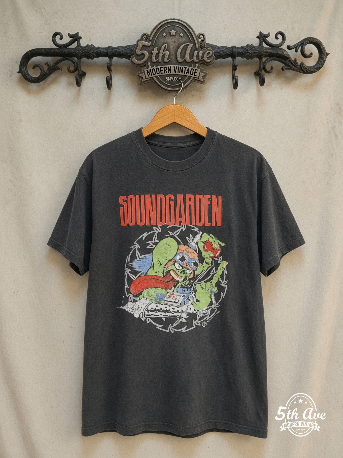 Soundgarden – Badmotorfinger Melt – Vintage Band T-Shirt — front on locked cream ornate 5th Ave rack