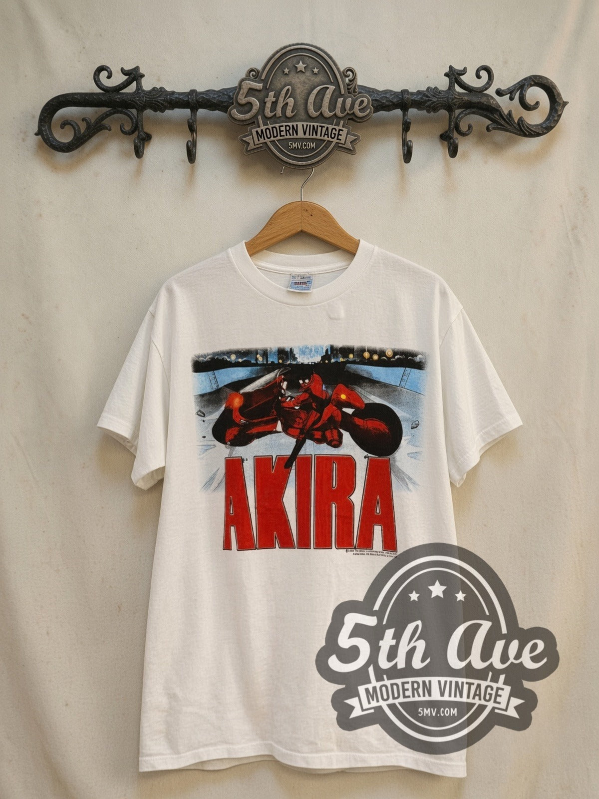 Akira Kaneda Bike vintage graphic t-shirt, front view on a display rack