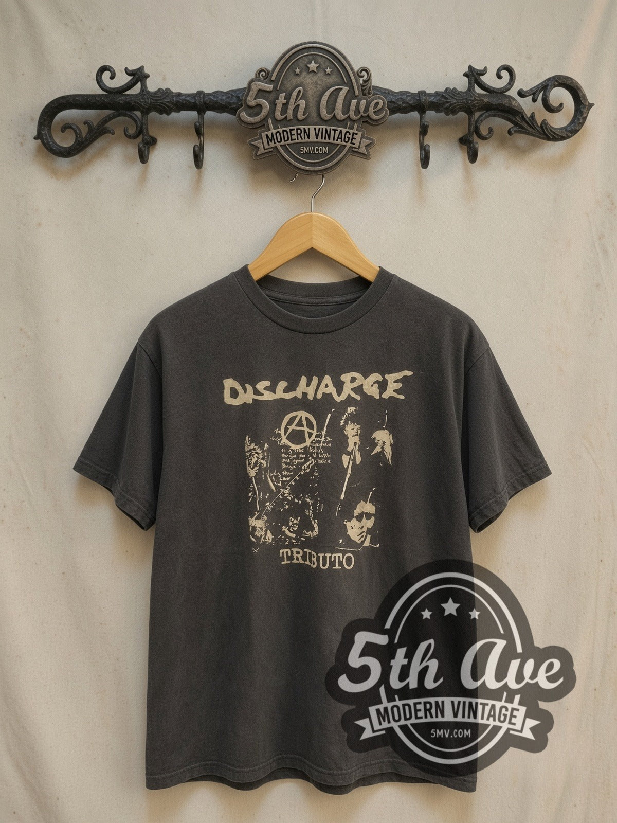 Discharge Tributo vintage band t-shirt, front view on a display rack