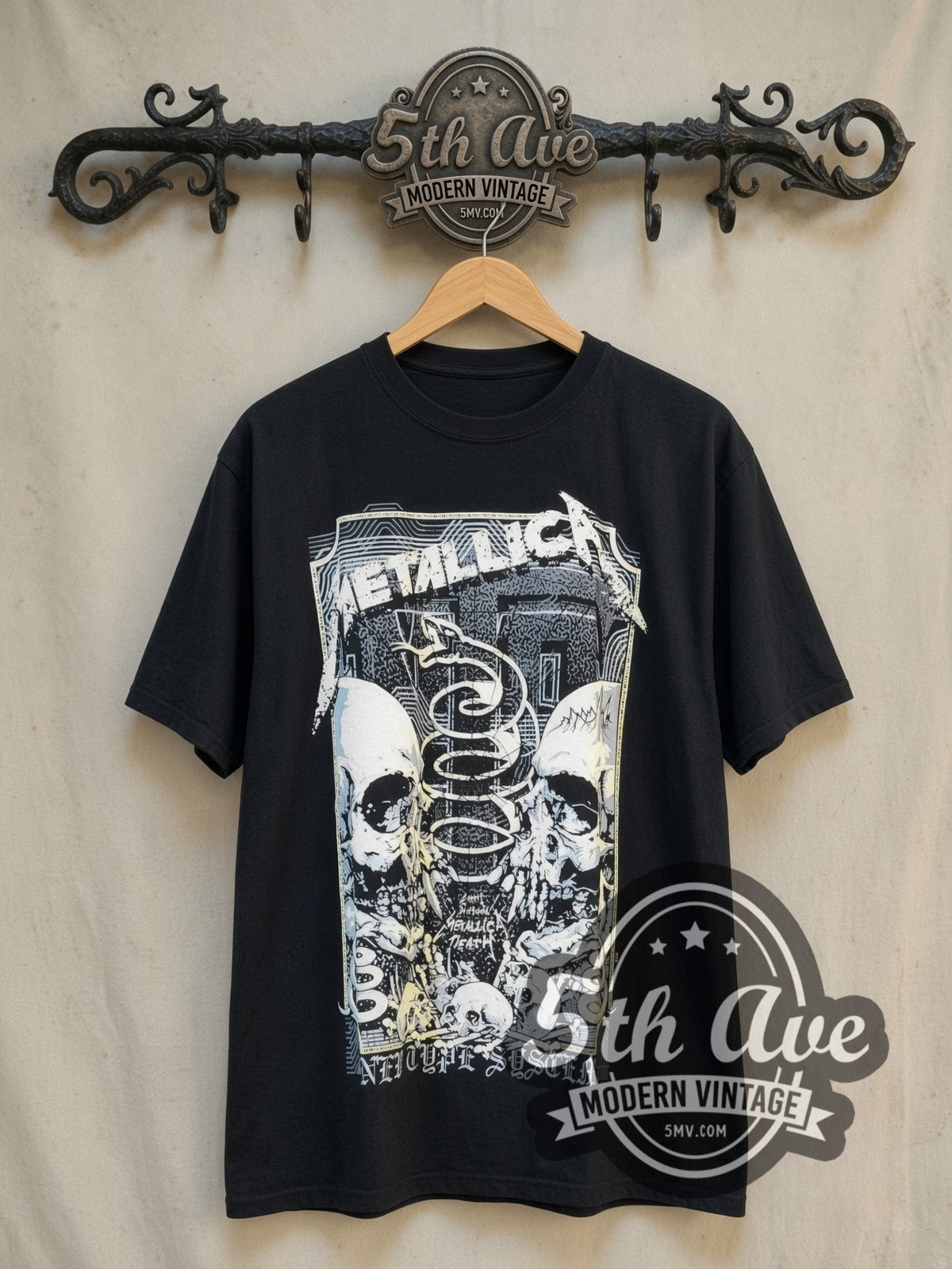 Metallica Birth School Twin Skulls Snake Banner vintage band t-shirt, front view on a display rack