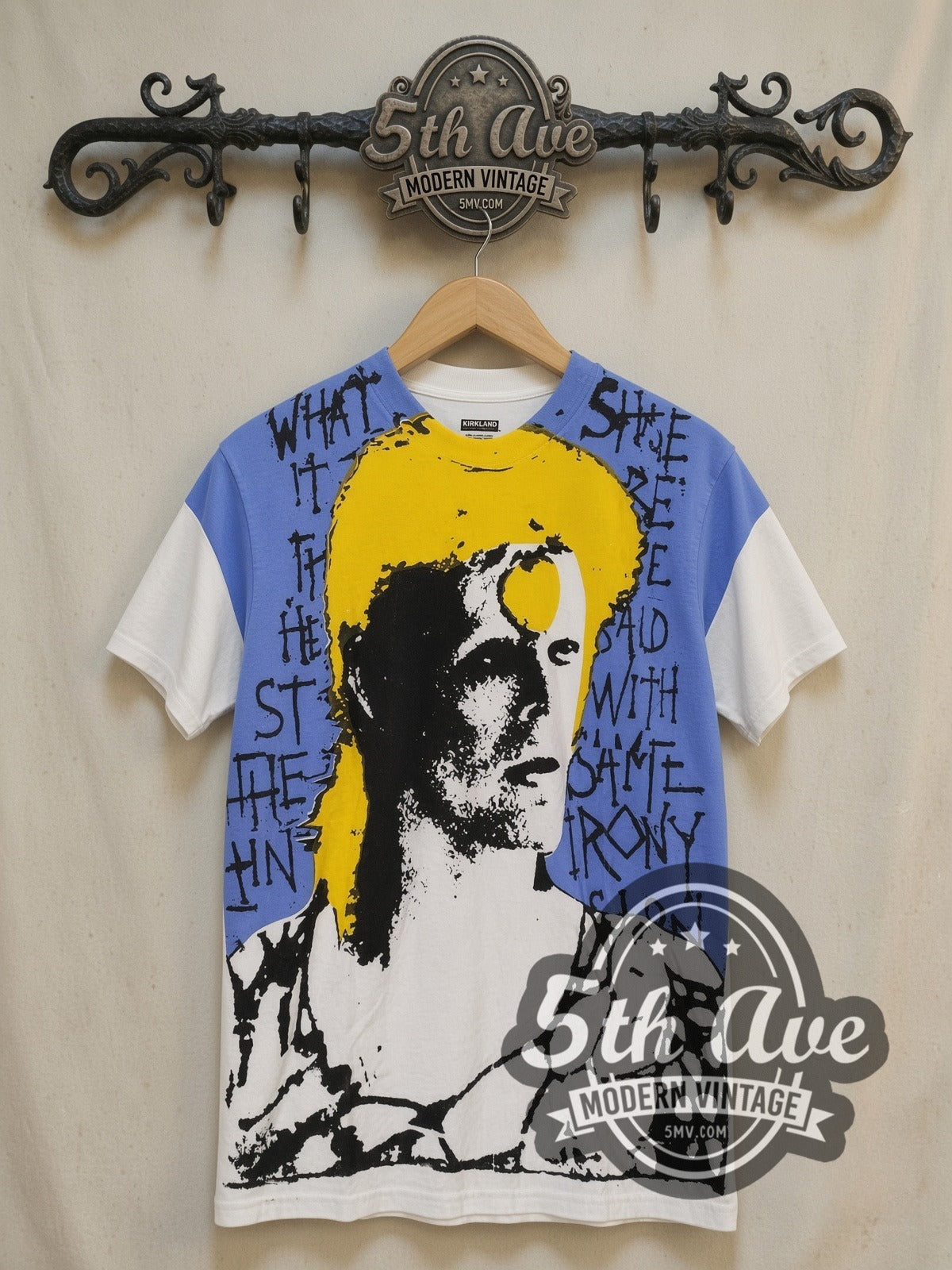 David Bowie Pop Art Portrait all-over-print vintage band t-shirt, front view on a display rack