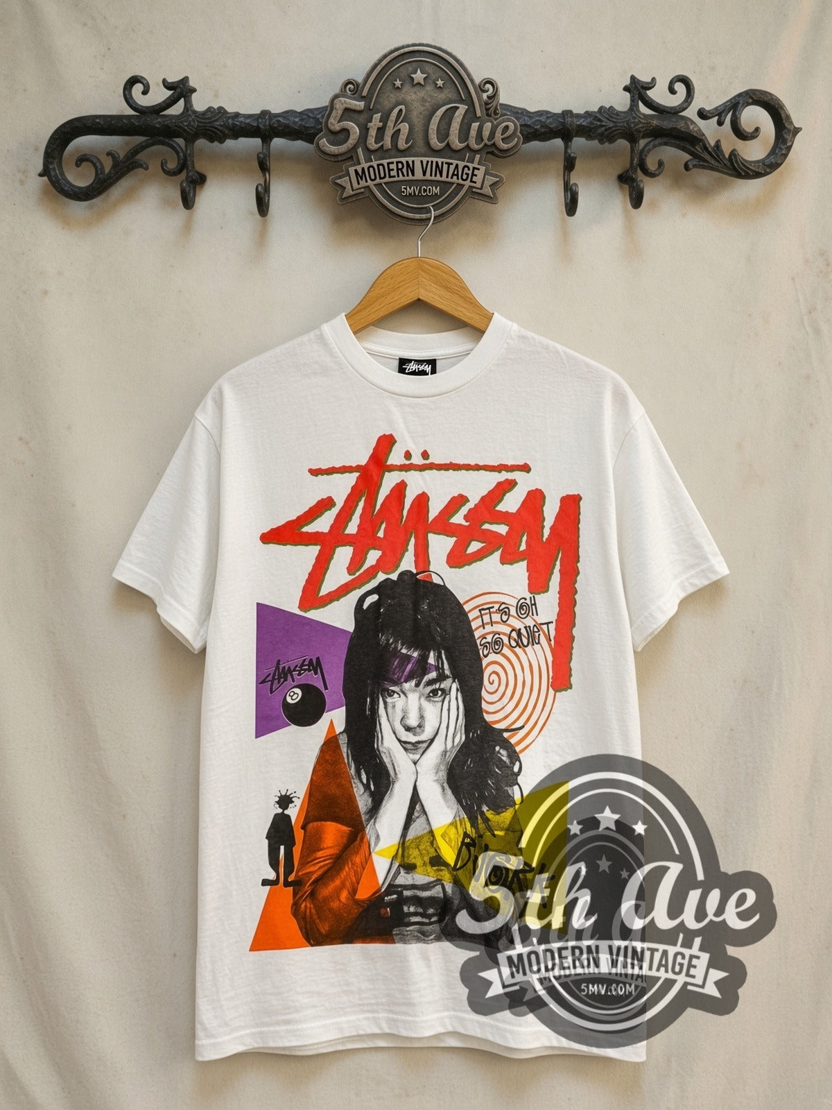 Björk It’s Oh So Quiet graphic tee in white, front view on a display rack