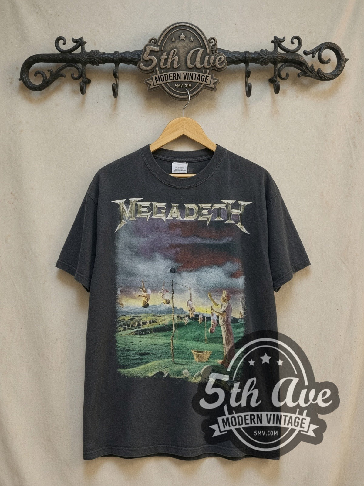 Megadeth Youthanasia Tour 1995 vintage band t-shirt, front view on a display rack