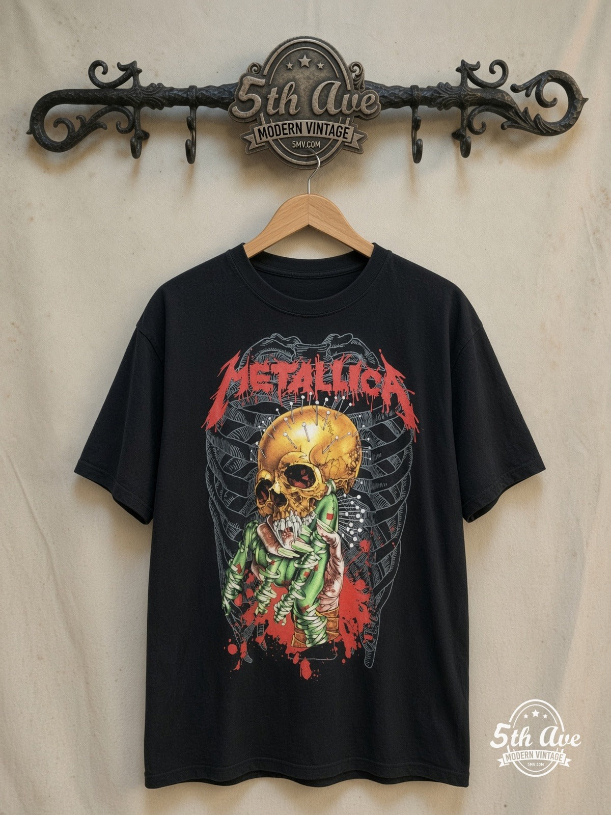Metallica – Yellow Skull Green Claw Blood Splash – Vintage Band T-Shirt — front on locked cream ornate 5th Ave rack