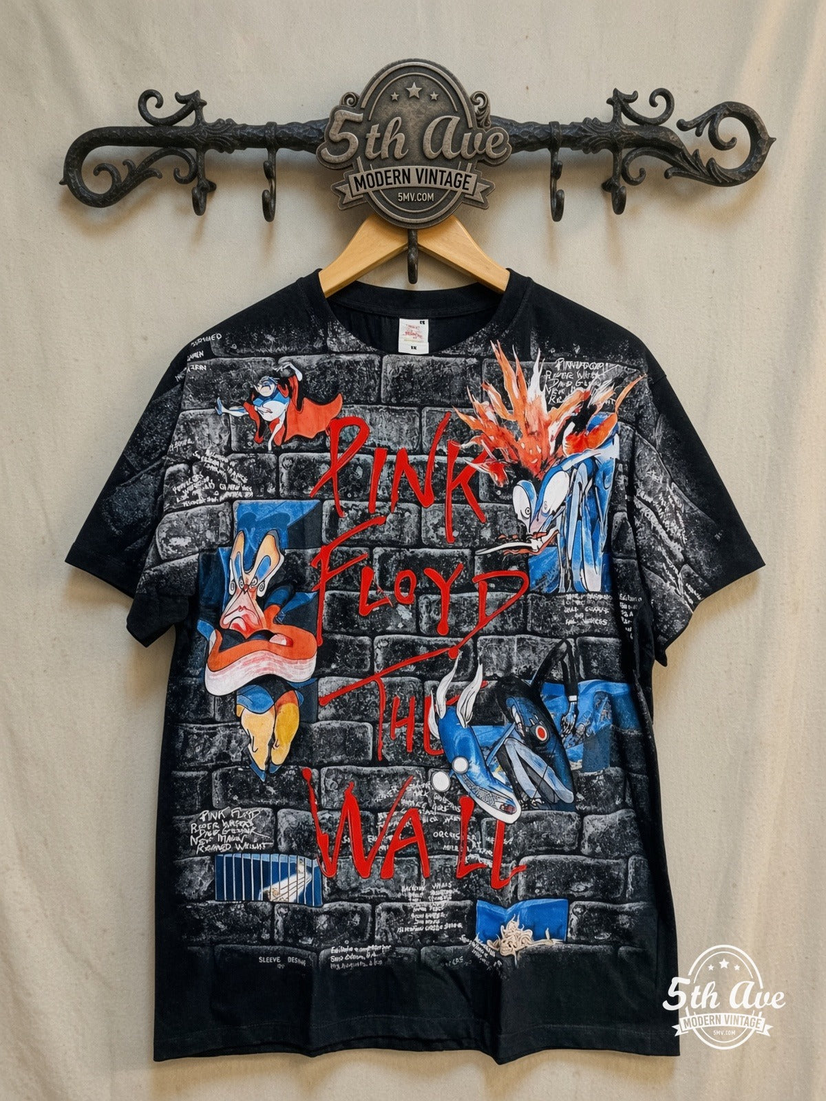 Pink Floyd – The Wall Brick Characters All Over Print – Vintage Band T-Shirt — front on locked cream ornate 5th Ave rack