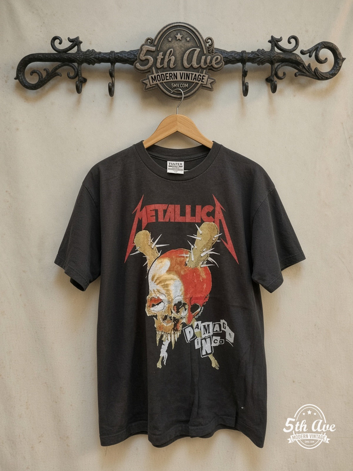 Metallica – Damage Inc. Split Red Skull – Vintage Band T-Shirt — front on locked cream ornate 5th Ave rack