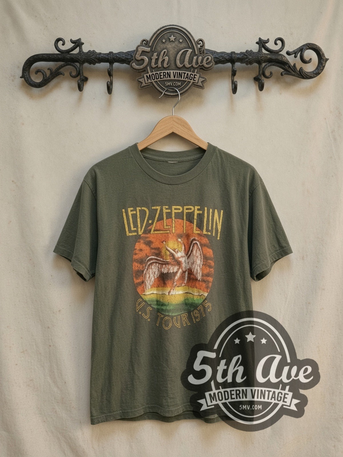 Led Zeppelin US Tour 1975 vintage band t-shirt, front view on a display rack