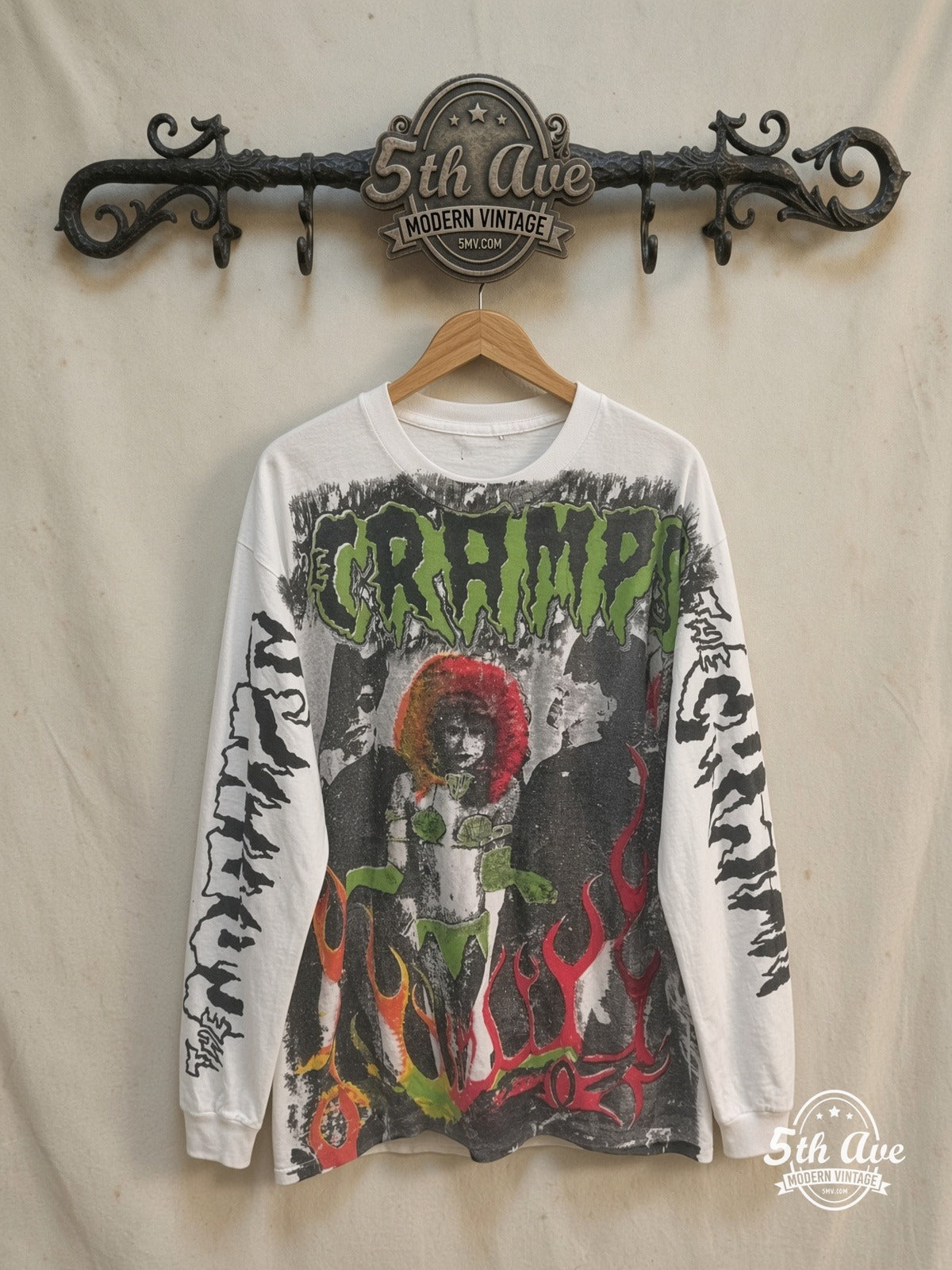 The Cramps Rock Tribute vintage band t-shirt, front view on a display rack
