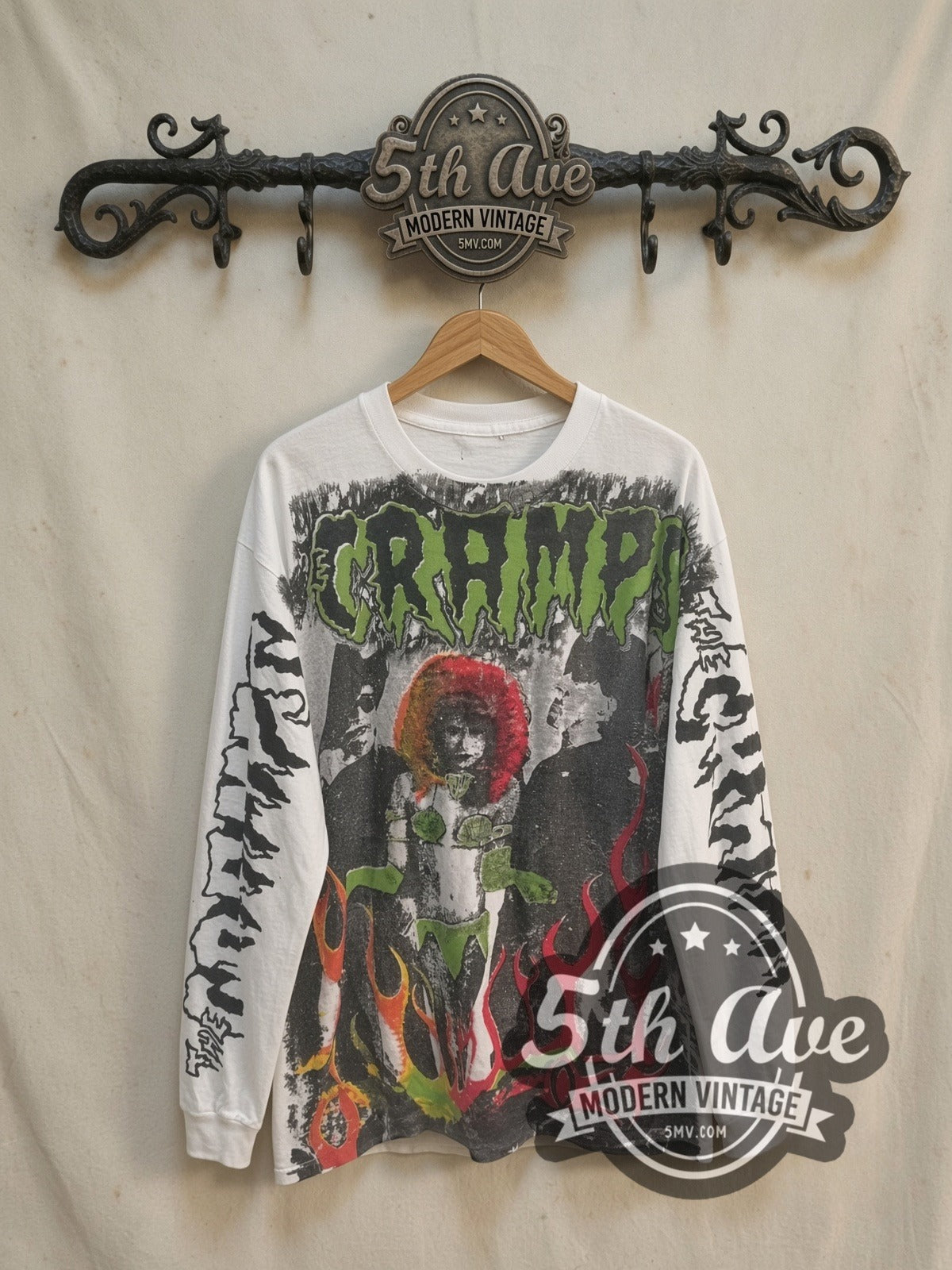 The Cramps Rock Tribute vintage band t-shirt, front view on a display rack
