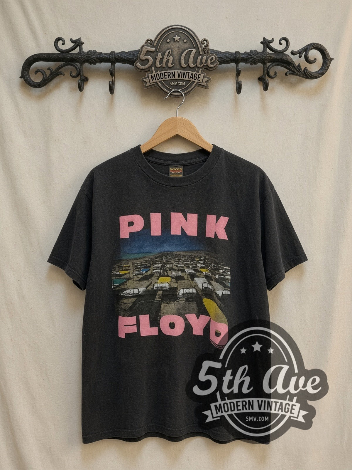 Pink Floyd Momentary Lapse of Reason Beds vintage band t-shirt, front view on a display rack
