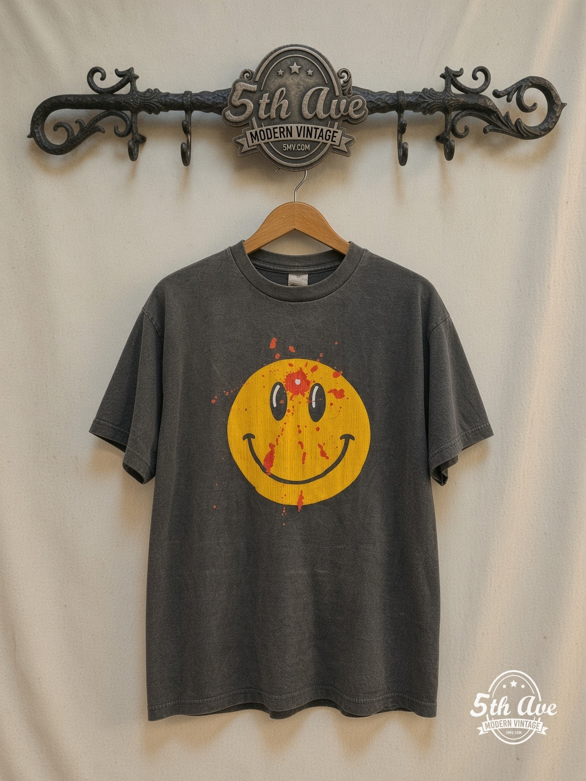 Smiley Face Bullet Hole – Vintage Band T-Shirt — front on locked cream ornate 5th Ave rack
