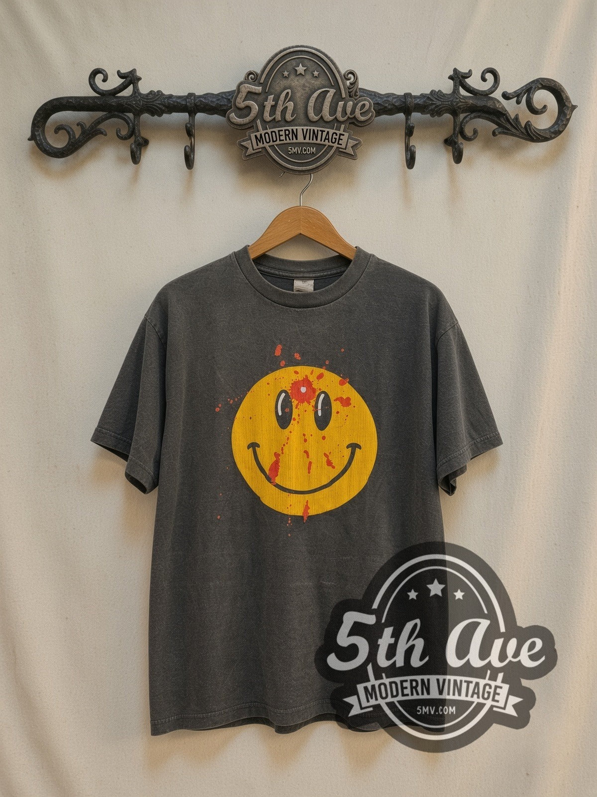 Smiley Face Bullet Hole vintage graphic t-shirt, front view on the 5MV rack