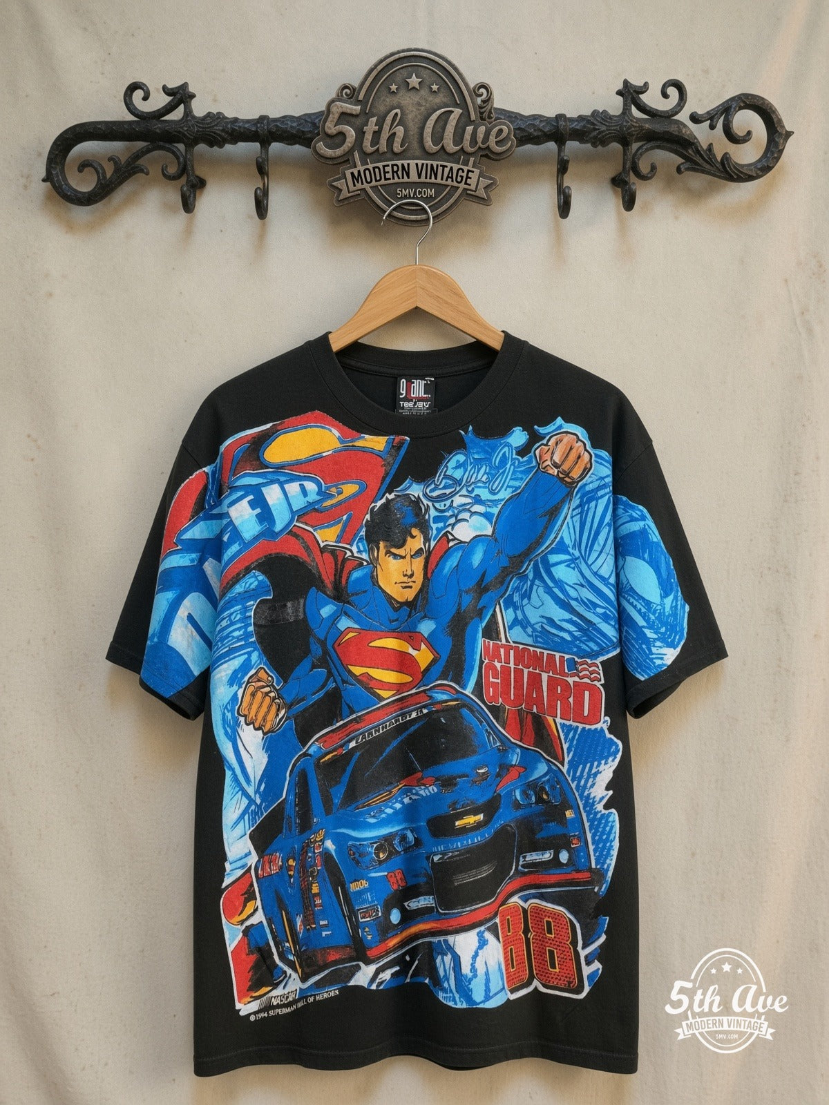 NASCAR – Superman & Dale Earnhardt Jr. No. 88 – All Over Print – Vintage Graphic Tee — front on locked cream ornate 5th Ave rack