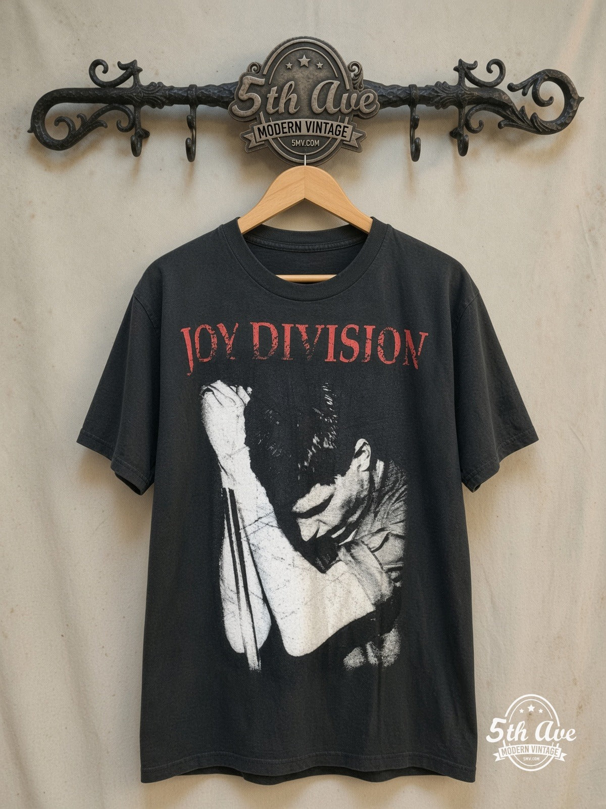 Ian Curtis – Joy Division – Vintage Band T-Shirt — front on locked cream ornate 5th Ave rack