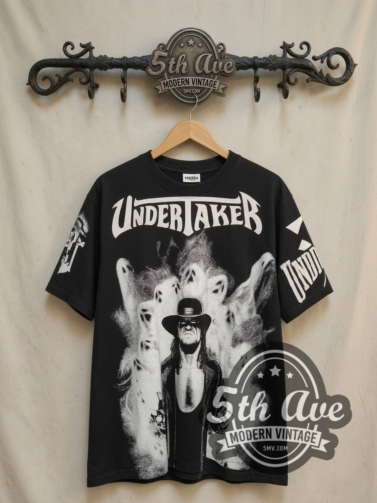 The Undertaker Wrestling Tribute vintage wrestling tee, front view on a display rack