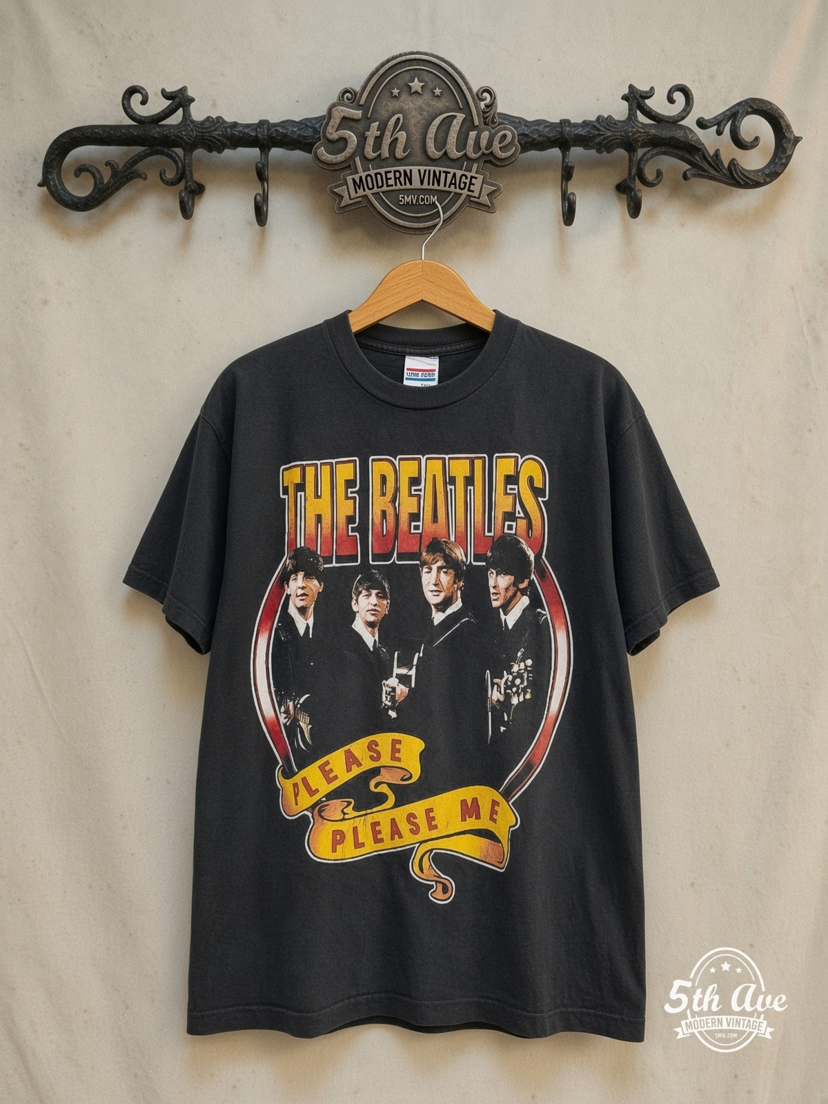 The Beatles – Please Please Me 1963 – Vintage Band T-Shirt — front on locked cream ornate 5th Ave rack