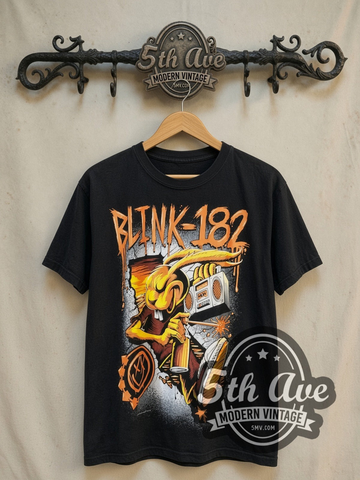 Blink-182 Punk Bunny vintage band t-shirt, front view on a display rack