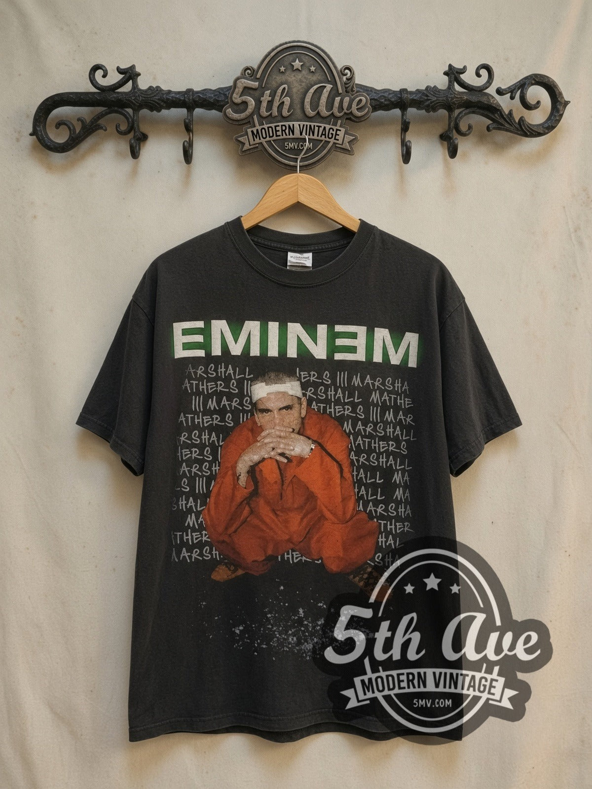 Eminem Criminal Tour 2000 vintage band t-shirt, front view on a display rack