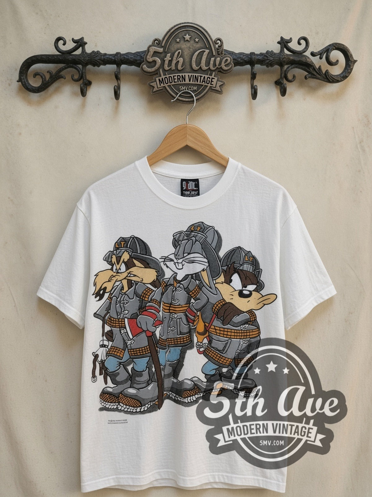 Looney Tunes Bugs Bunny, Taz-Mania and Ralph Wolf vintage cartoon tee, front view on a display rack