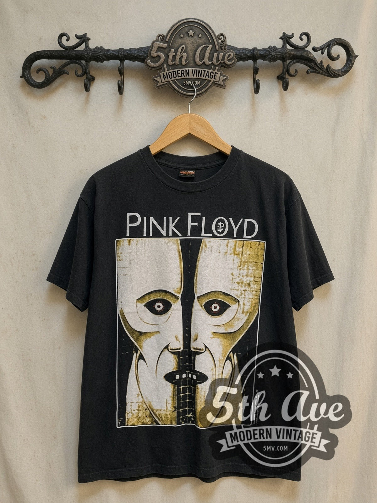 Pink Floyd The Division Bell vintage band t-shirt, front view on a display rack