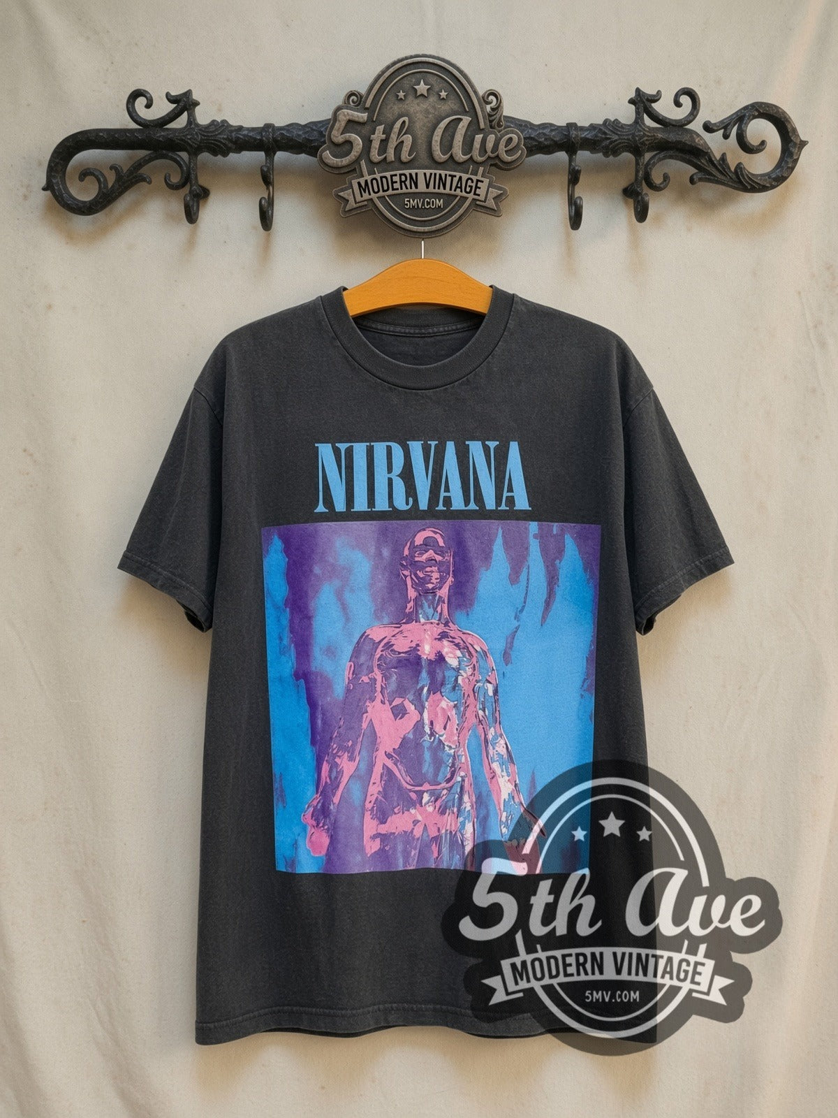 Nirvana Sliver Anatomical Figure Charcoal vintage band t-shirt, front view on a display rack