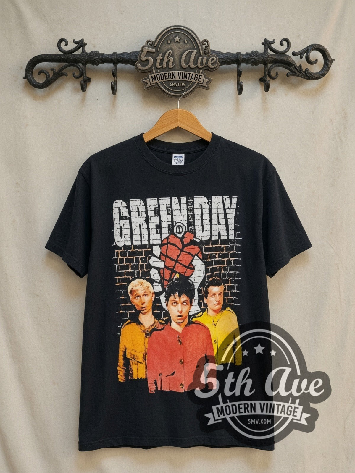 Green Day American Idiot Brick Wall Heart Grenade vintage band t-shirt in black, front view on the 5MV rack