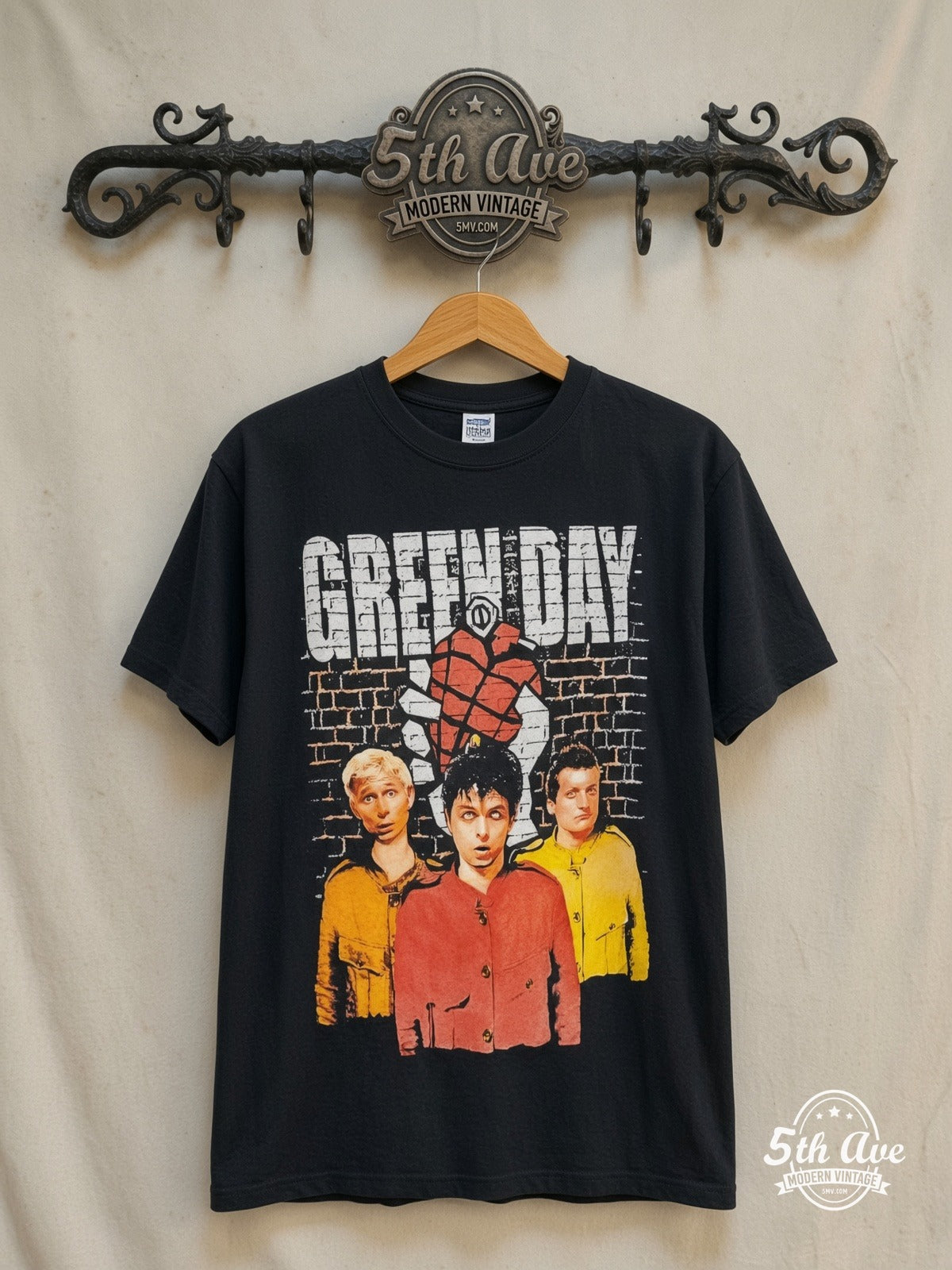 Green Day – American Idiot Brick Wall Heart Grenade – Vintage Band T-Shirt — front on locked cream ornate 5th Ave rack