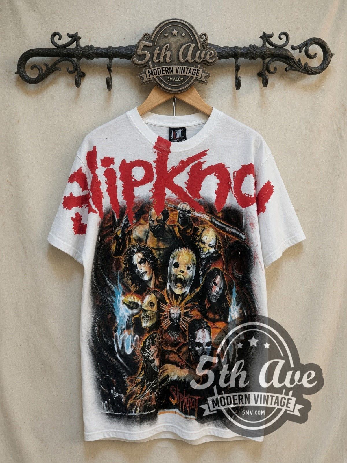 Slipknot Masks and Goat all-over-print vintage band t-shirt in white, front view on a display rack