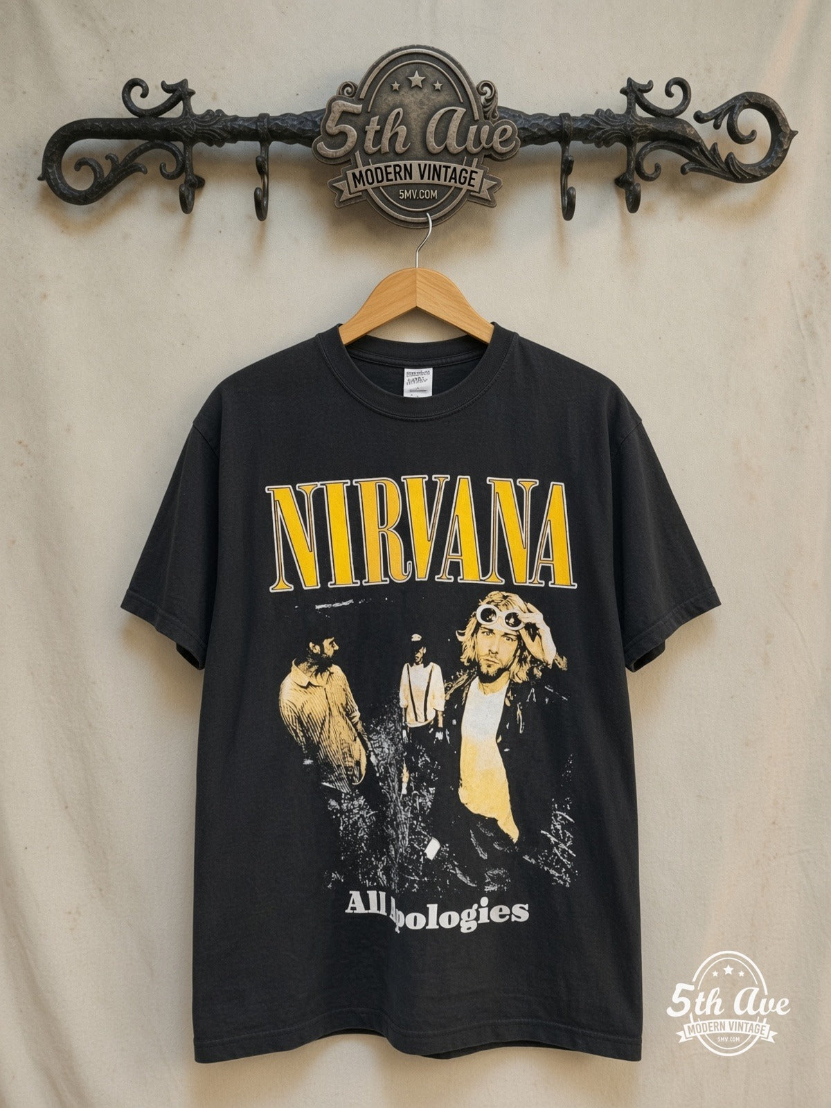 Nirvana – All Apologies – Vintage Band T-Shirt — front on locked cream ornate 5th Ave rack