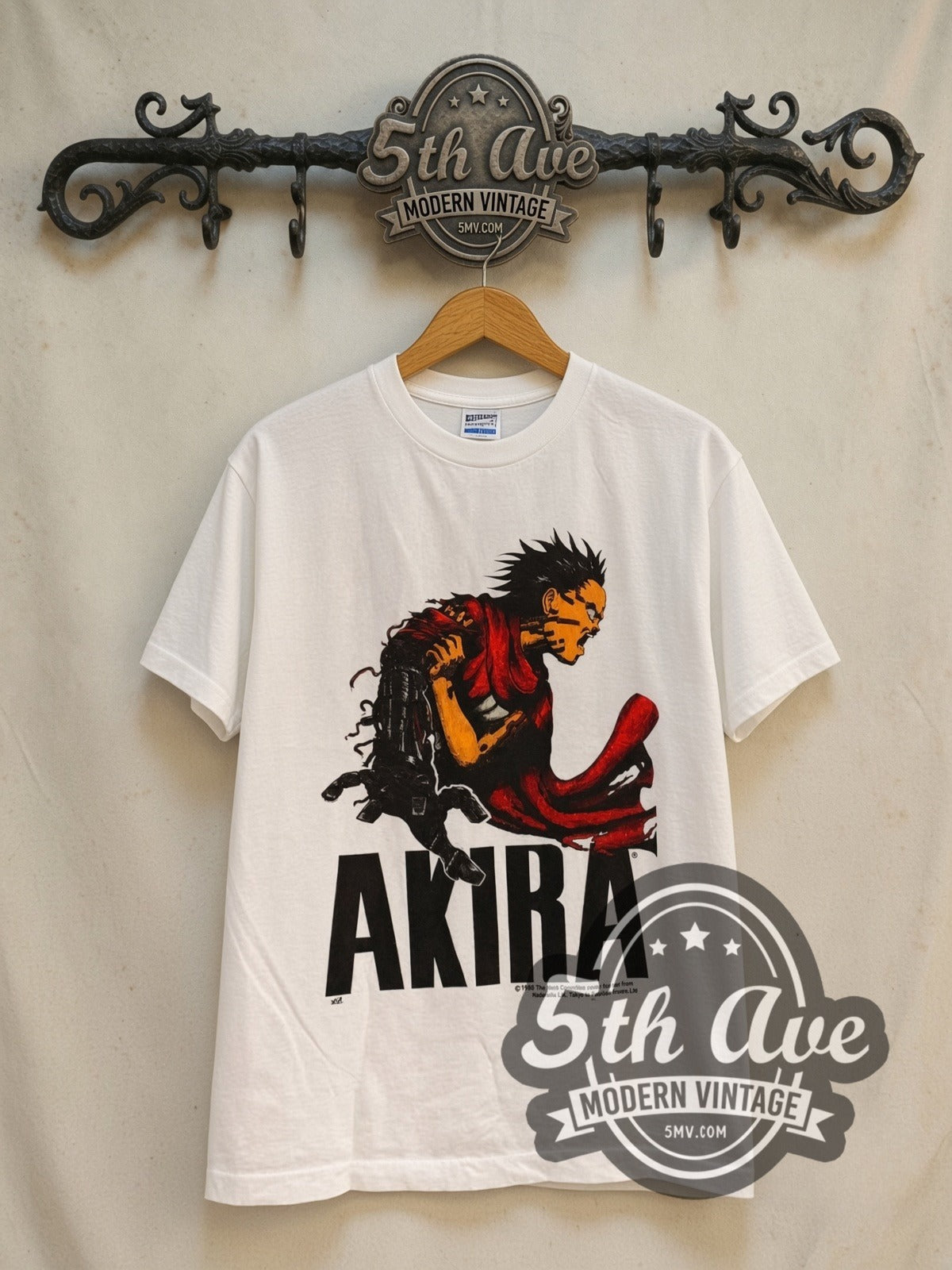 Akira Tetsuo Shima vintage graphic t-shirt, front view on a display rack