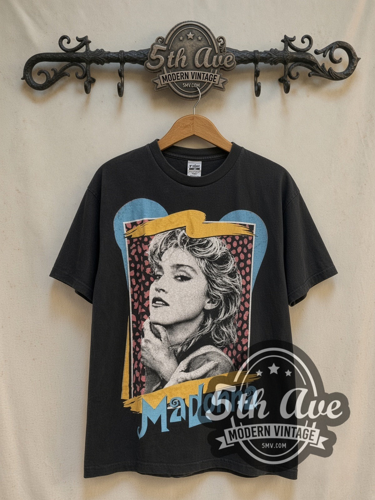 Madonna Leopard Frame Portrait vintage band t-shirt, front view on a display rack