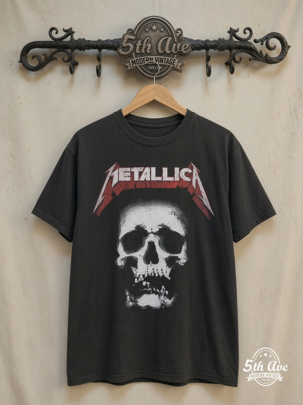 Metallica – 100% Cotton New Vintage Band T-Shirt – Vintage Band T-Shirt — front on locked cream ornate 5th Ave rack