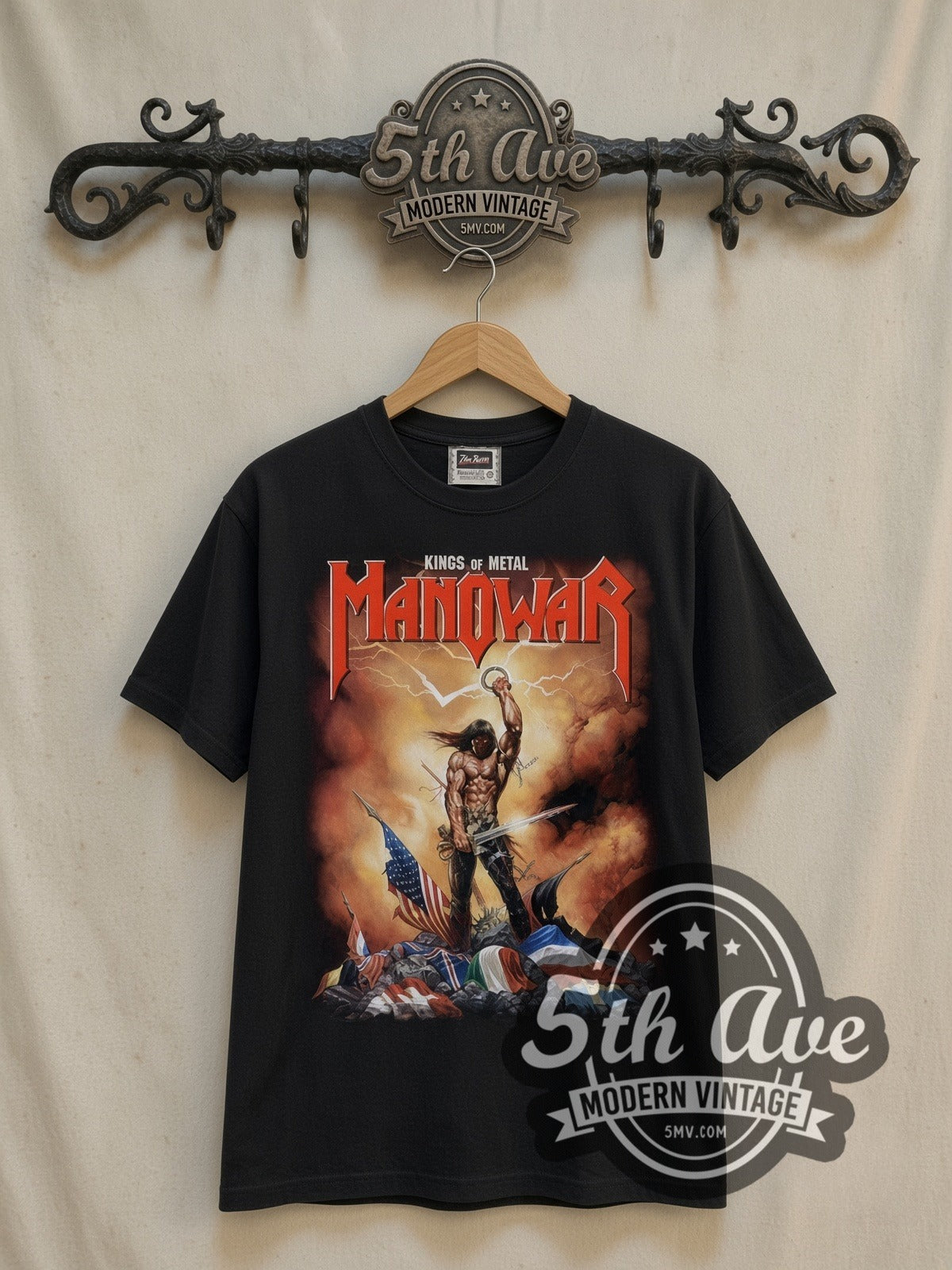 Manowar Kings of Metal vintage band t-shirt in black, front view on a display rack