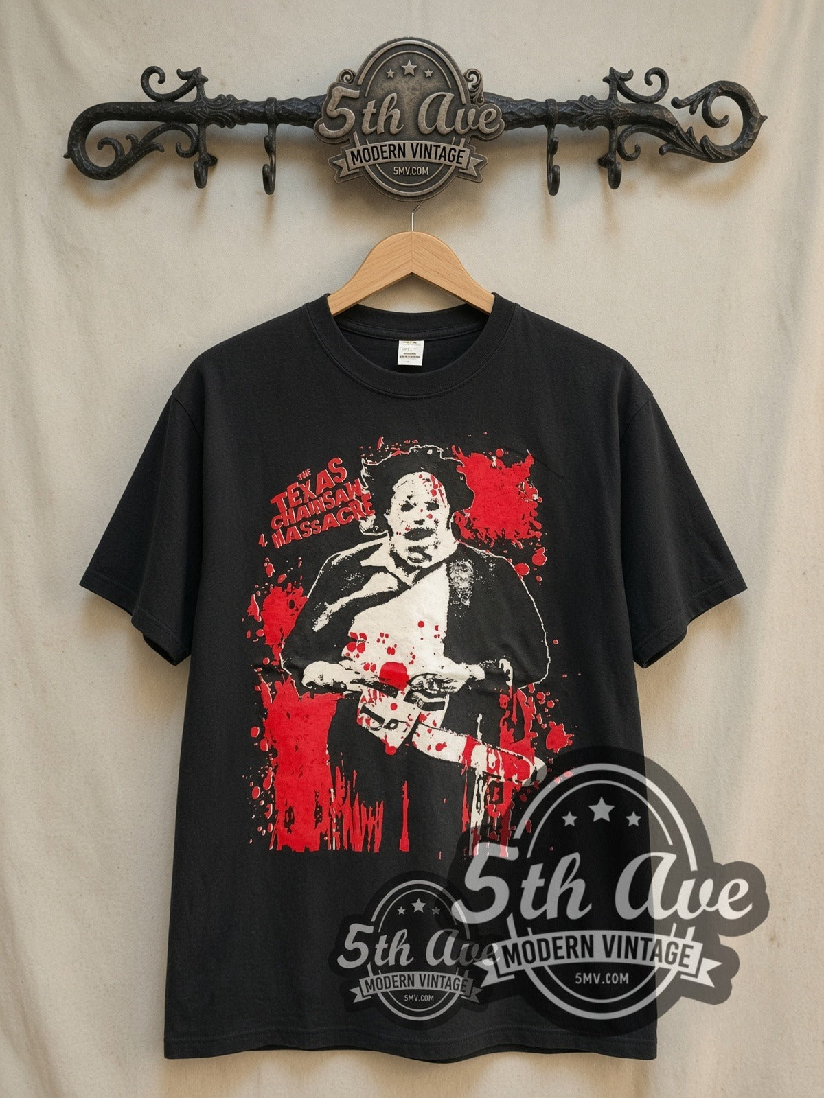 Texas Chainsaw Massacre The Leatherface vintage graphic t-shirt, front view on a display rack