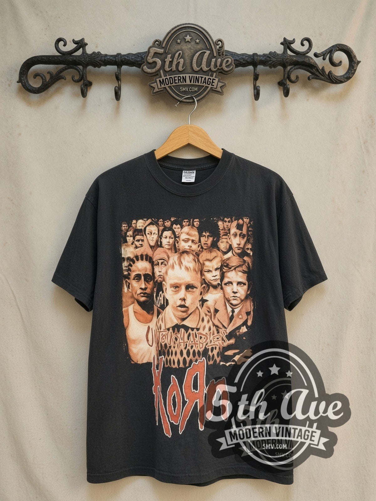 Korn Untouchables vintage band t-shirt in black, front view on a display rack