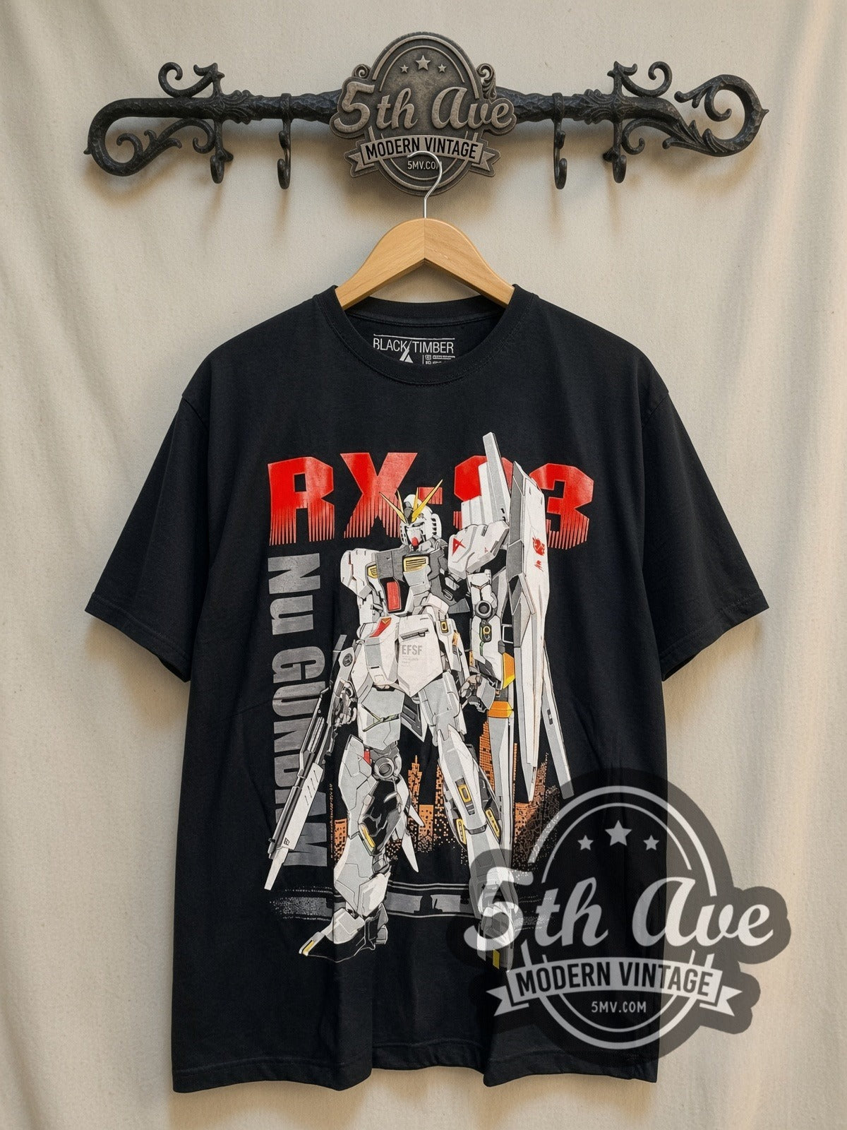 Gundam RX-93 vintage graphic t-shirt, front view on a display rack