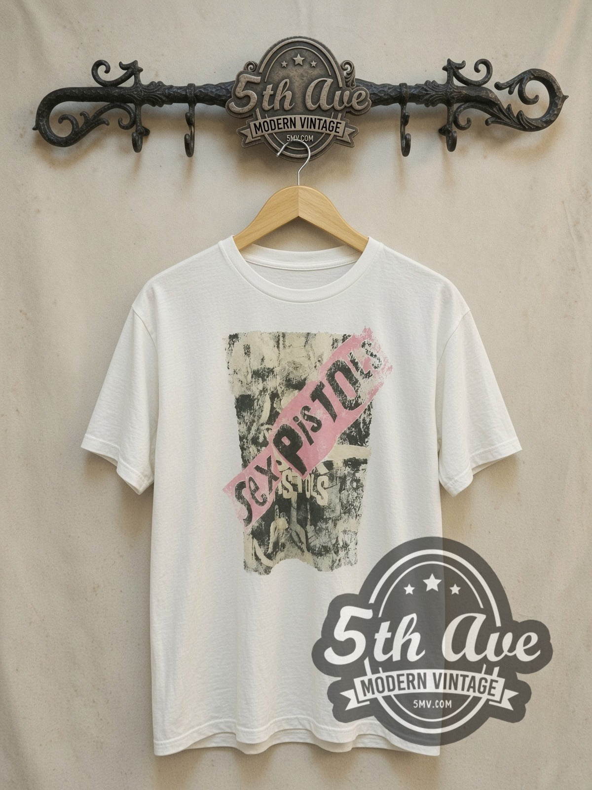Sex Pistols vintage band t-shirt, front view on a display rack