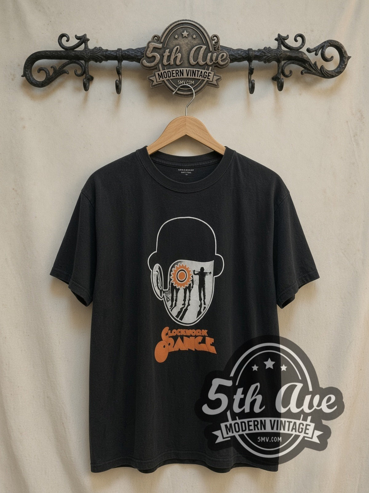 A Clockwork Orange Bowler Hat Cog Eye Droogs Poster vintage movie t-shirt, front view on a display rack