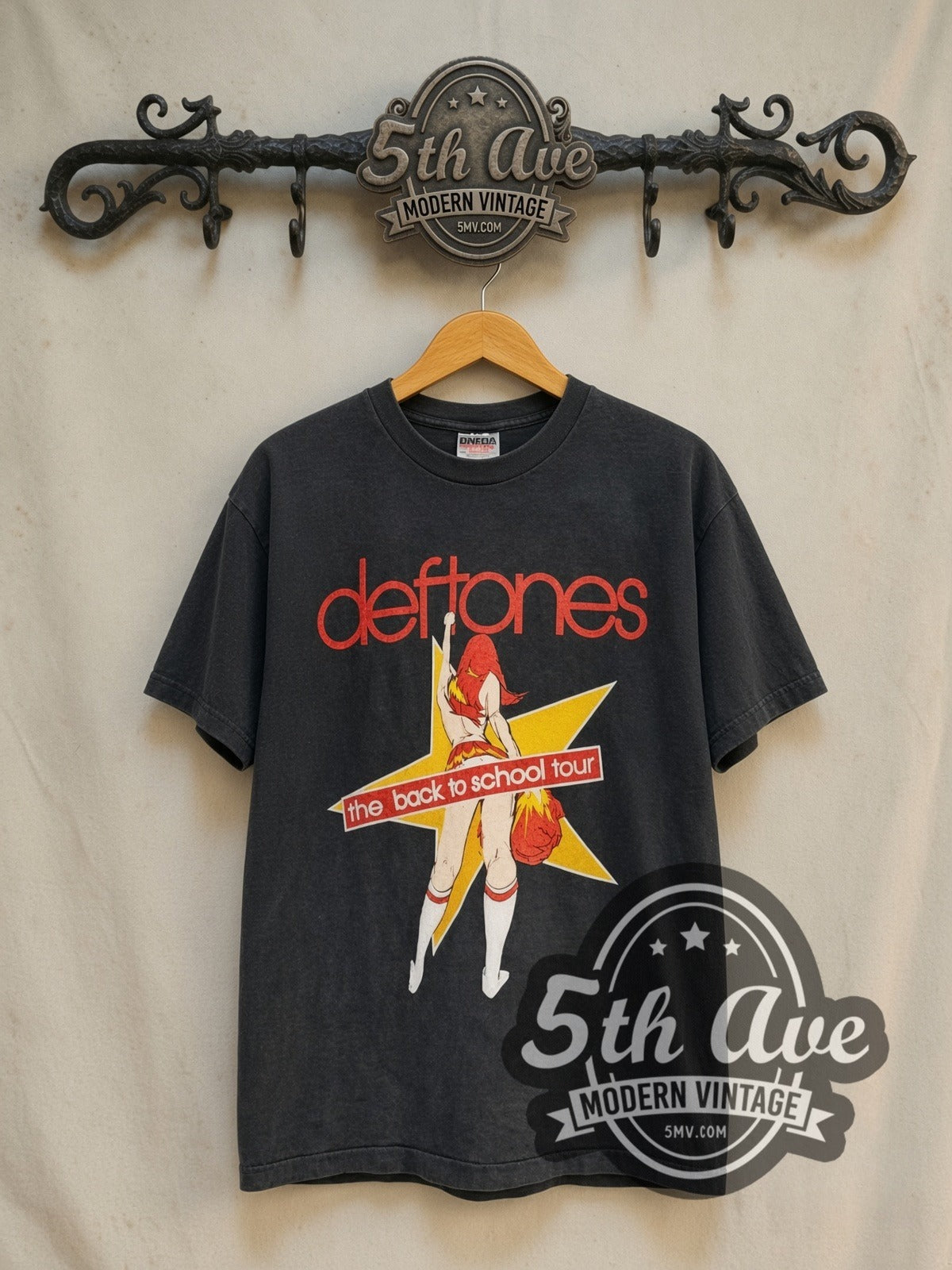 Deftones The Back to School Tour B2S vintage band t-shirt in black, front view on a display rack