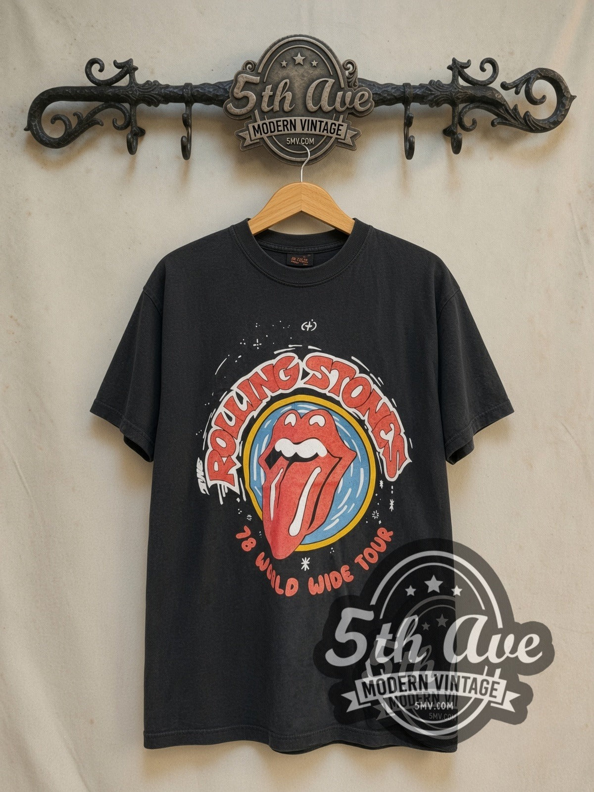 The Rolling Stones World Wide Tour 1978' It's Only Rock 'n Roll vintage band t-shirt in black, front view on a display rack