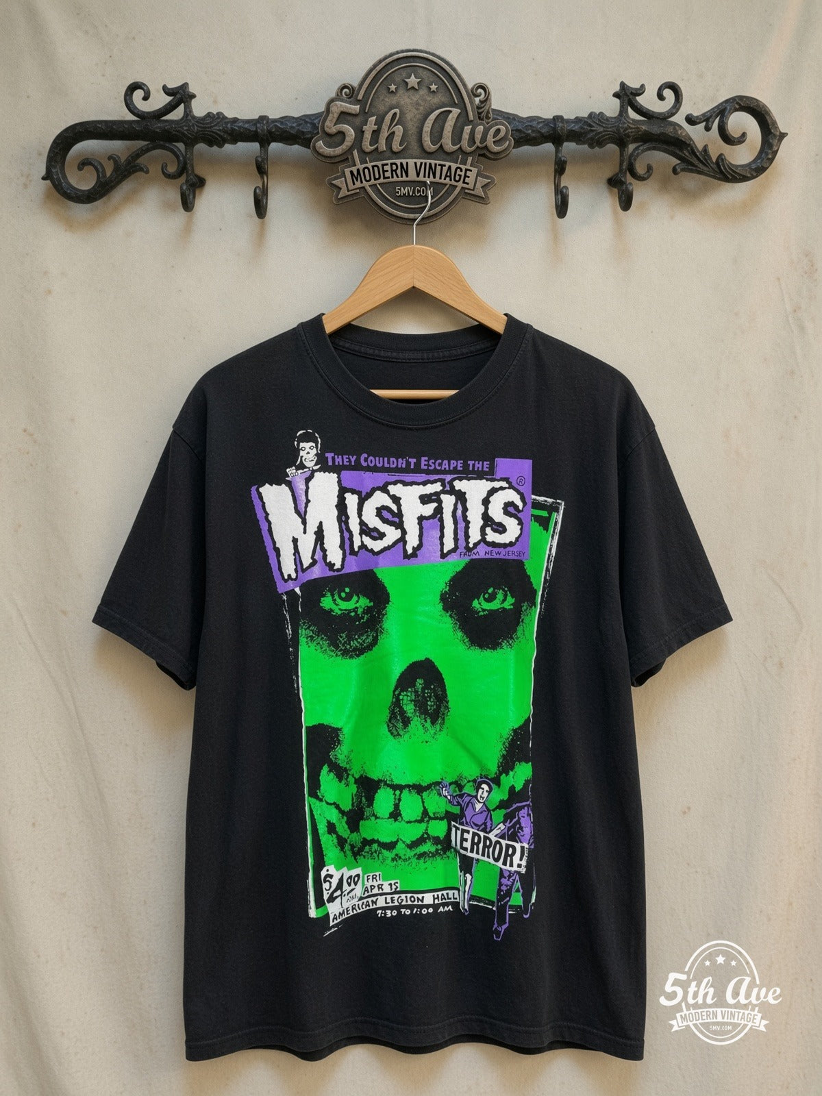 Misfits They Couldn't Escape the Misfits vintage band t-shirt, front view on a display rack