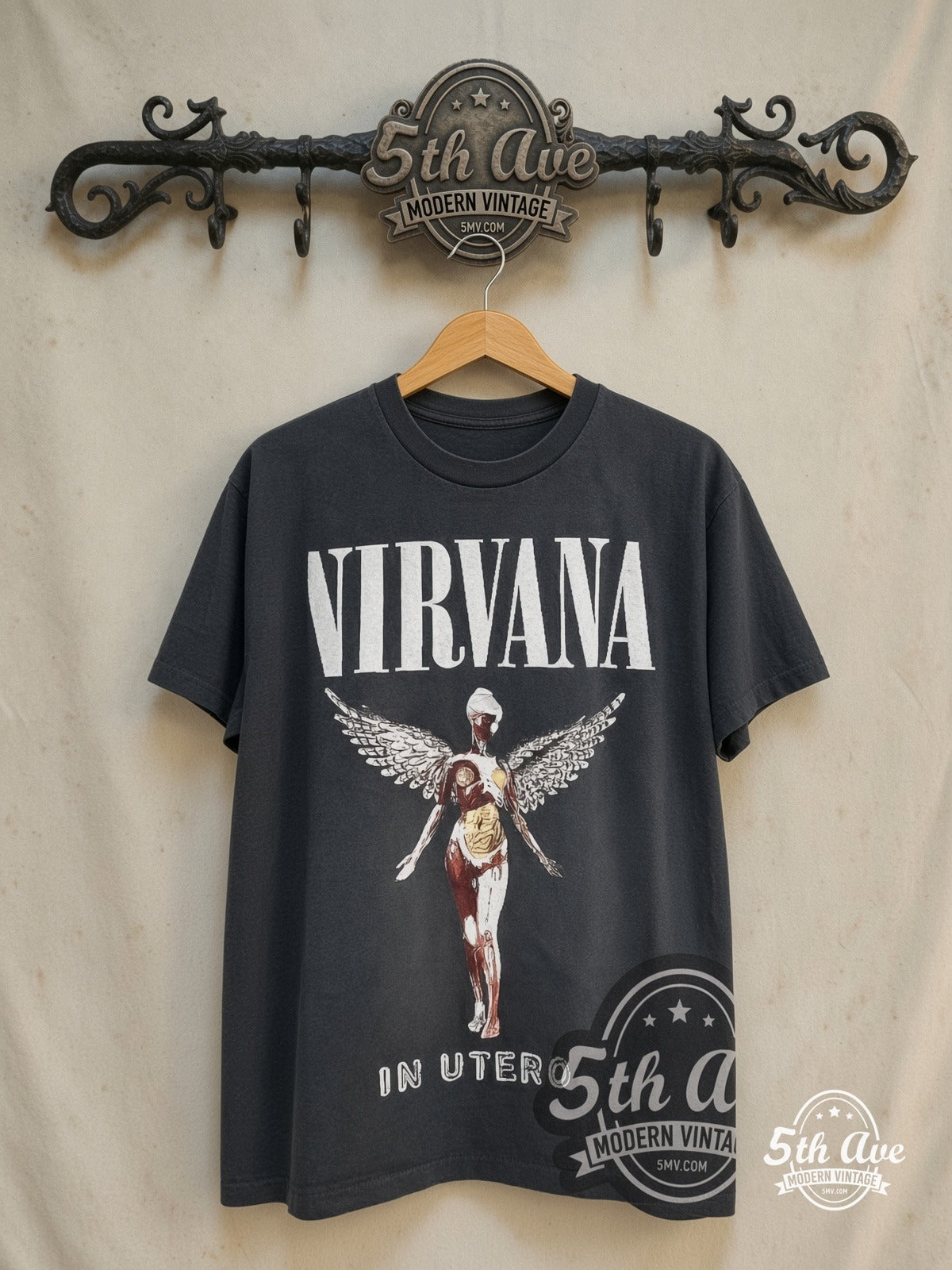Nirvana – In Utero White Wing – Vintage Band T-Shirt — front on locked cream ornate 5th Ave rack