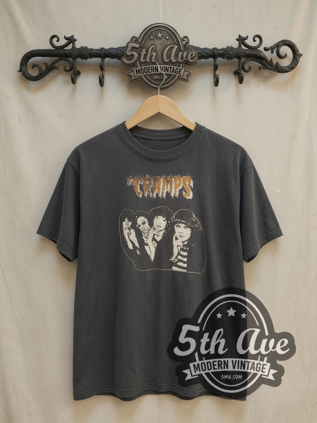 The Cramps Band Photo vintage band t-shirt, front view on a display rack