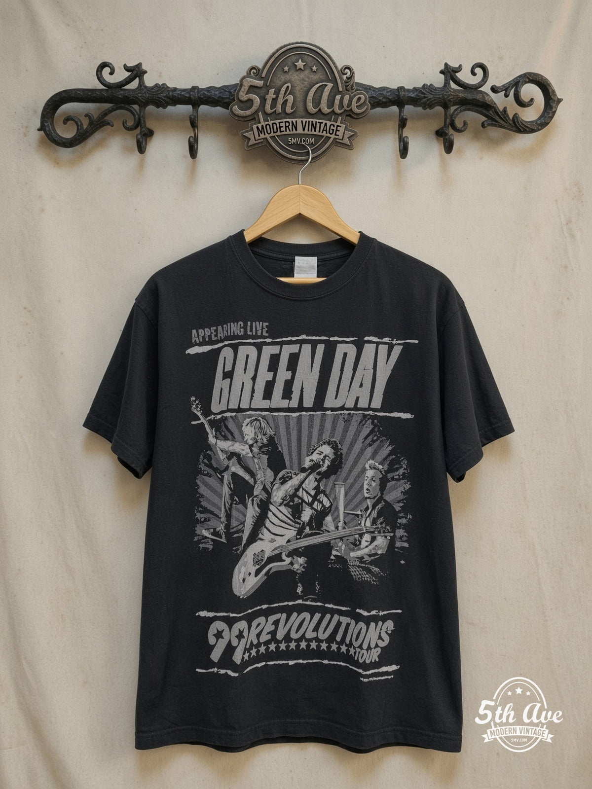 Green Day – 99 Revolutions Tour – Vintage Band T-Shirt — front on locked cream ornate 5th Ave rack