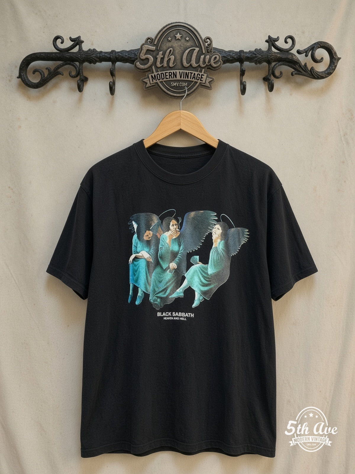 Black Sabbath – Heaven and Hell – Vintage Band T-Shirt — front on locked cream ornate 5th Ave rack