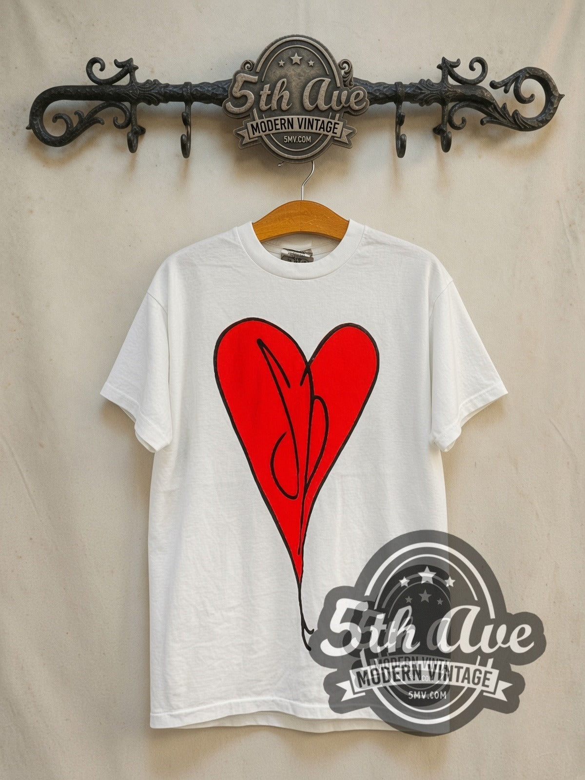 The Smashing Pumpkins Siamese Dream vintage band t-shirt in white, front view on a display rack